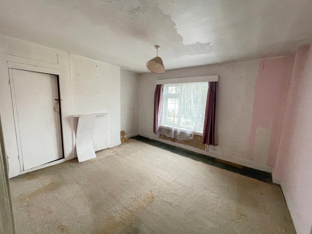 Lot: 1 - THREE-BEDROOM TERRACE HOUSE FOR REFURBISHMENT - Bedroom one with window